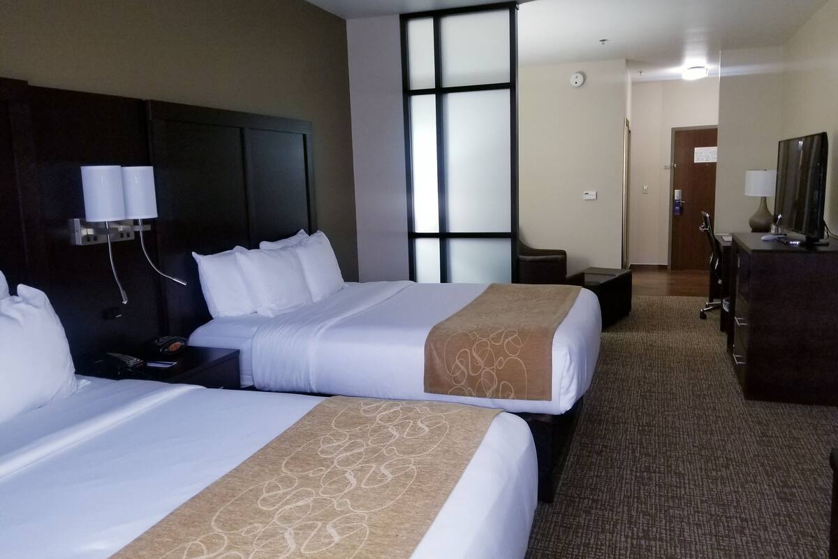 premium bedding, desk, laptop workspace, blackout curtains