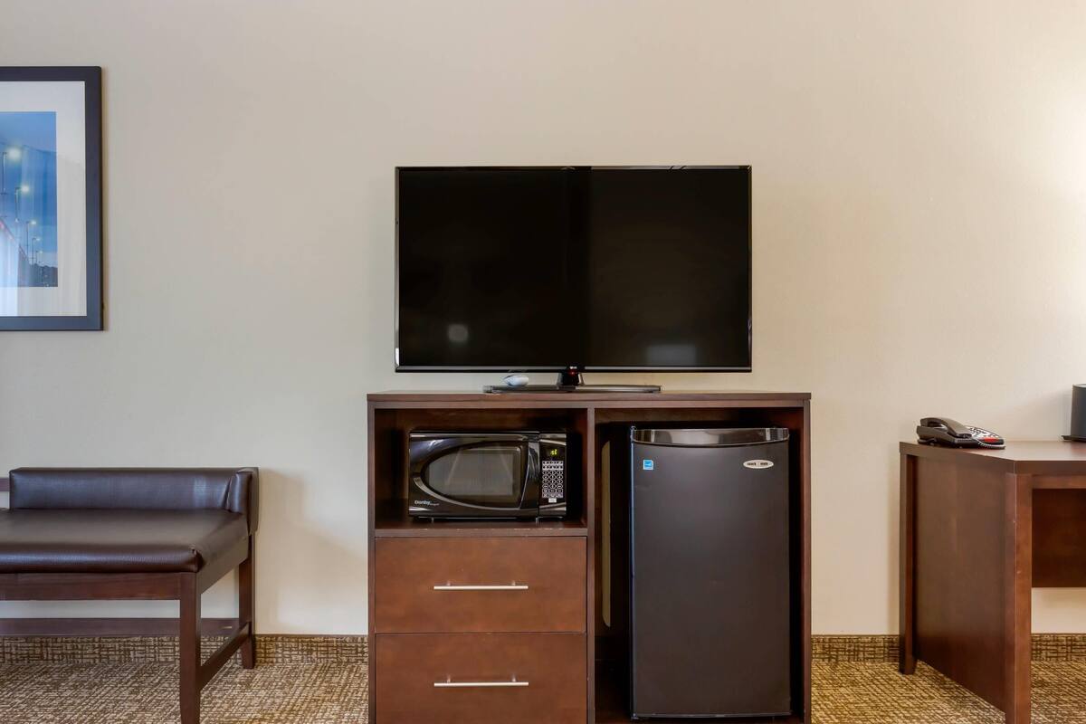 premium bedding, desk, laptop workspace, blackout curtains