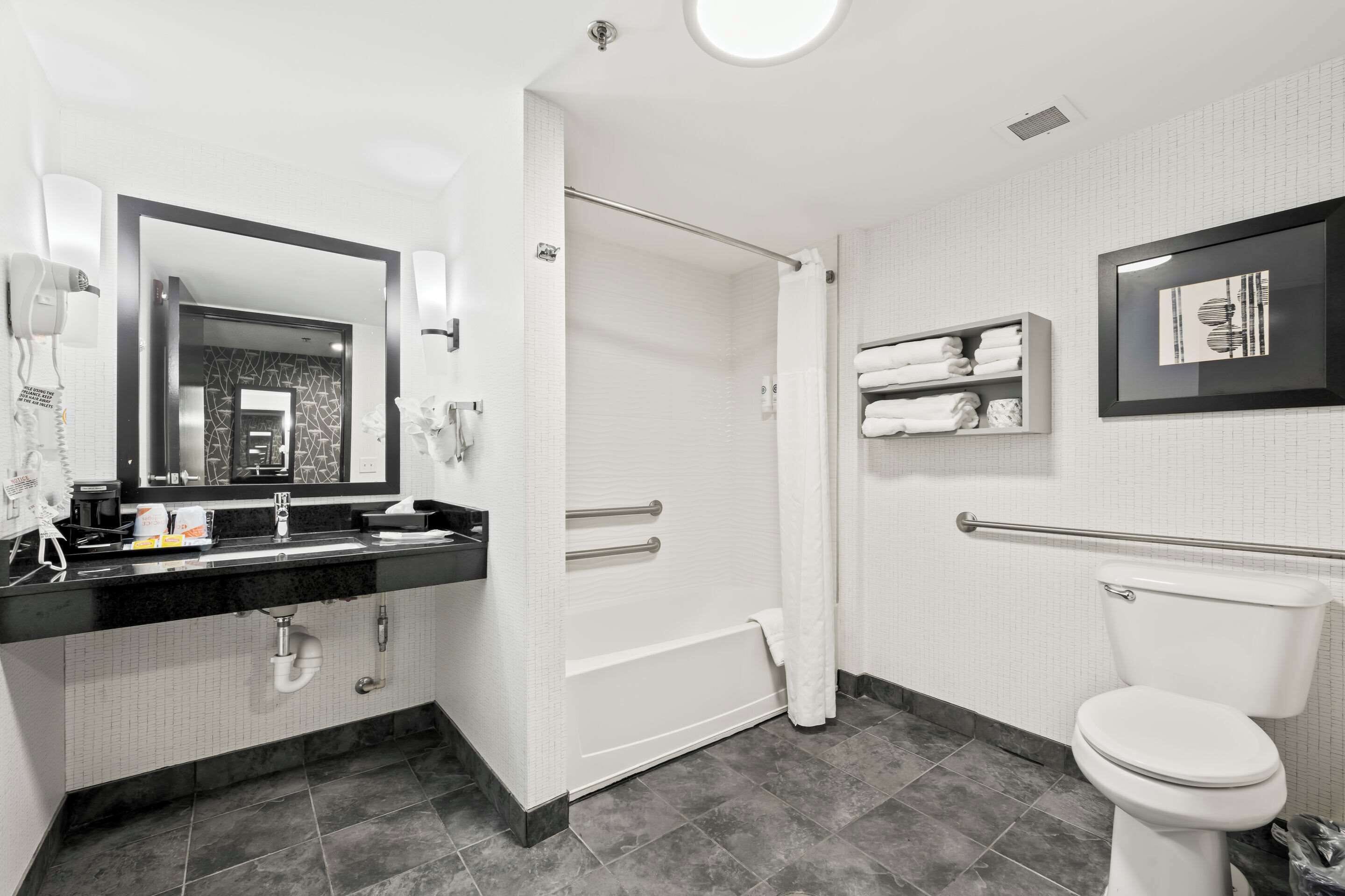 desk, laptop workspace, blackout curtains, iron/ironing board