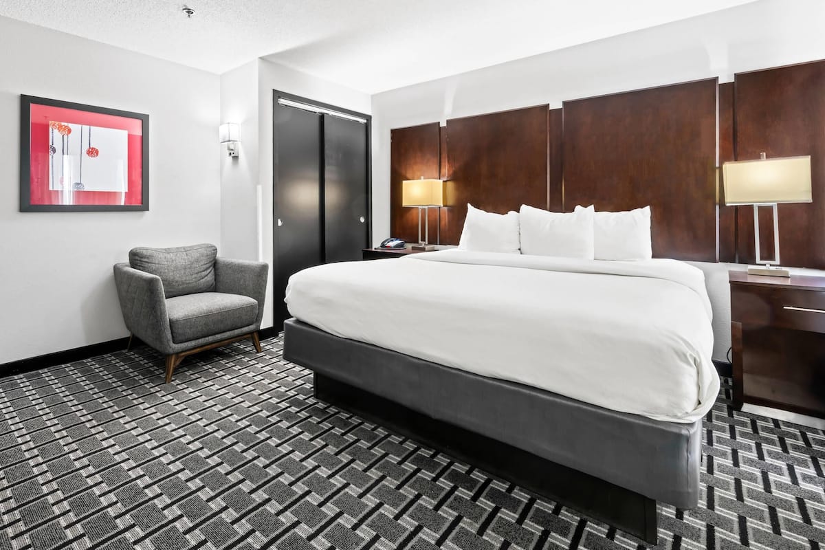 Desk, laptop workspace, blackout curtains, iron/ironing board