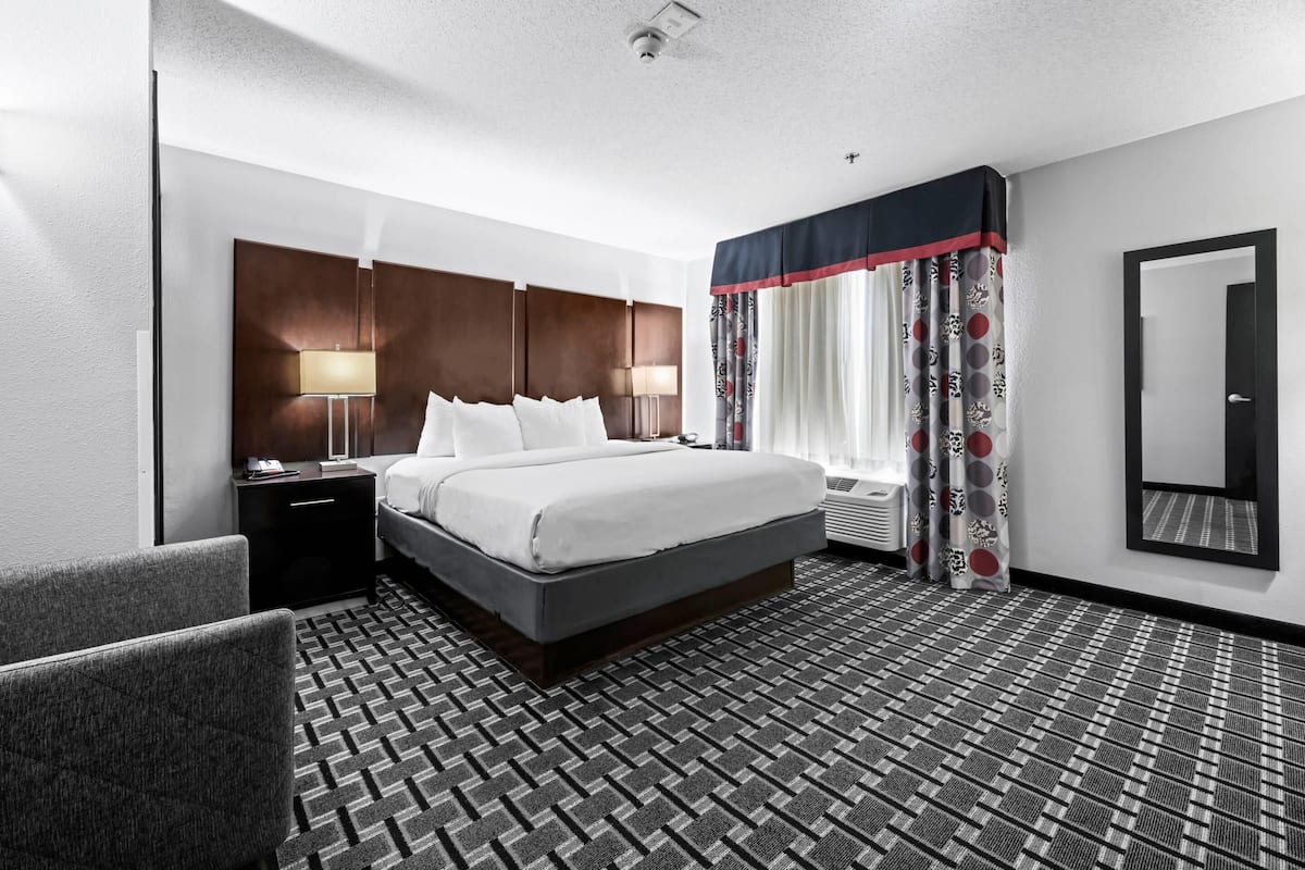 Desk, laptop workspace, blackout curtains, iron/ironing board