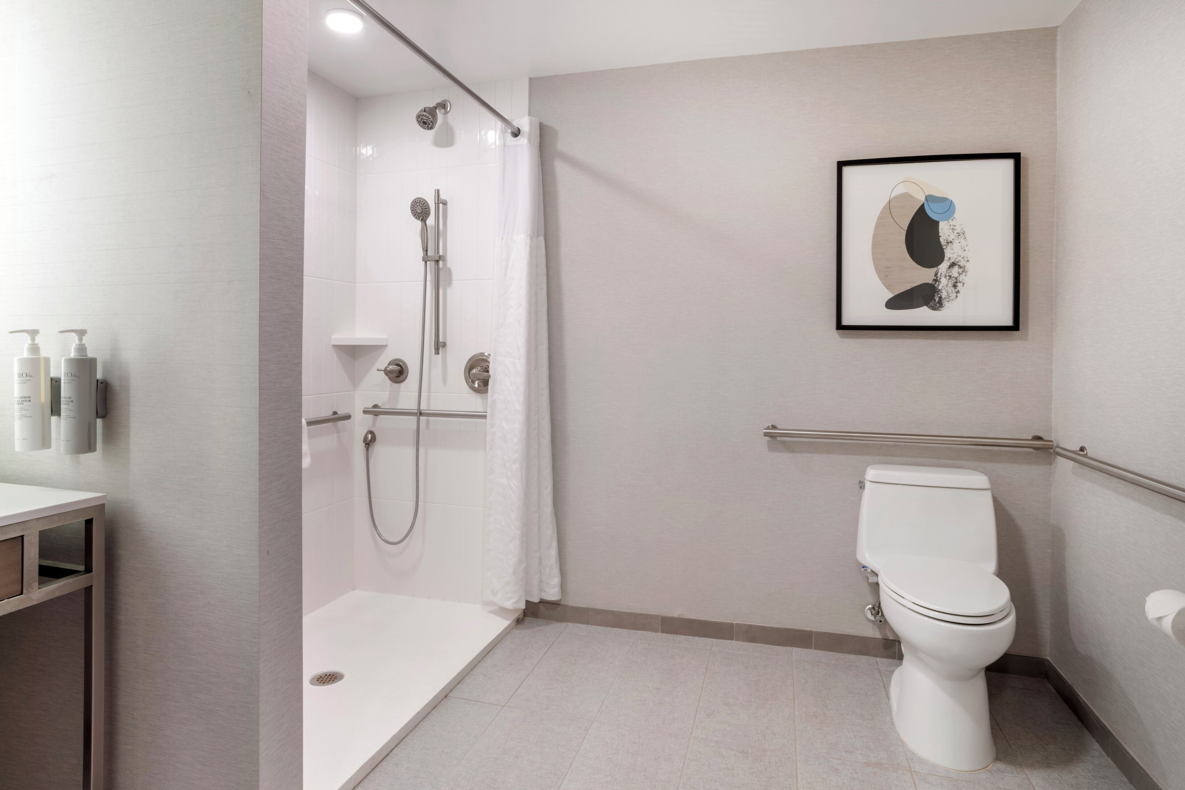 combined shower/bathtub, hair dryer, towels, soap