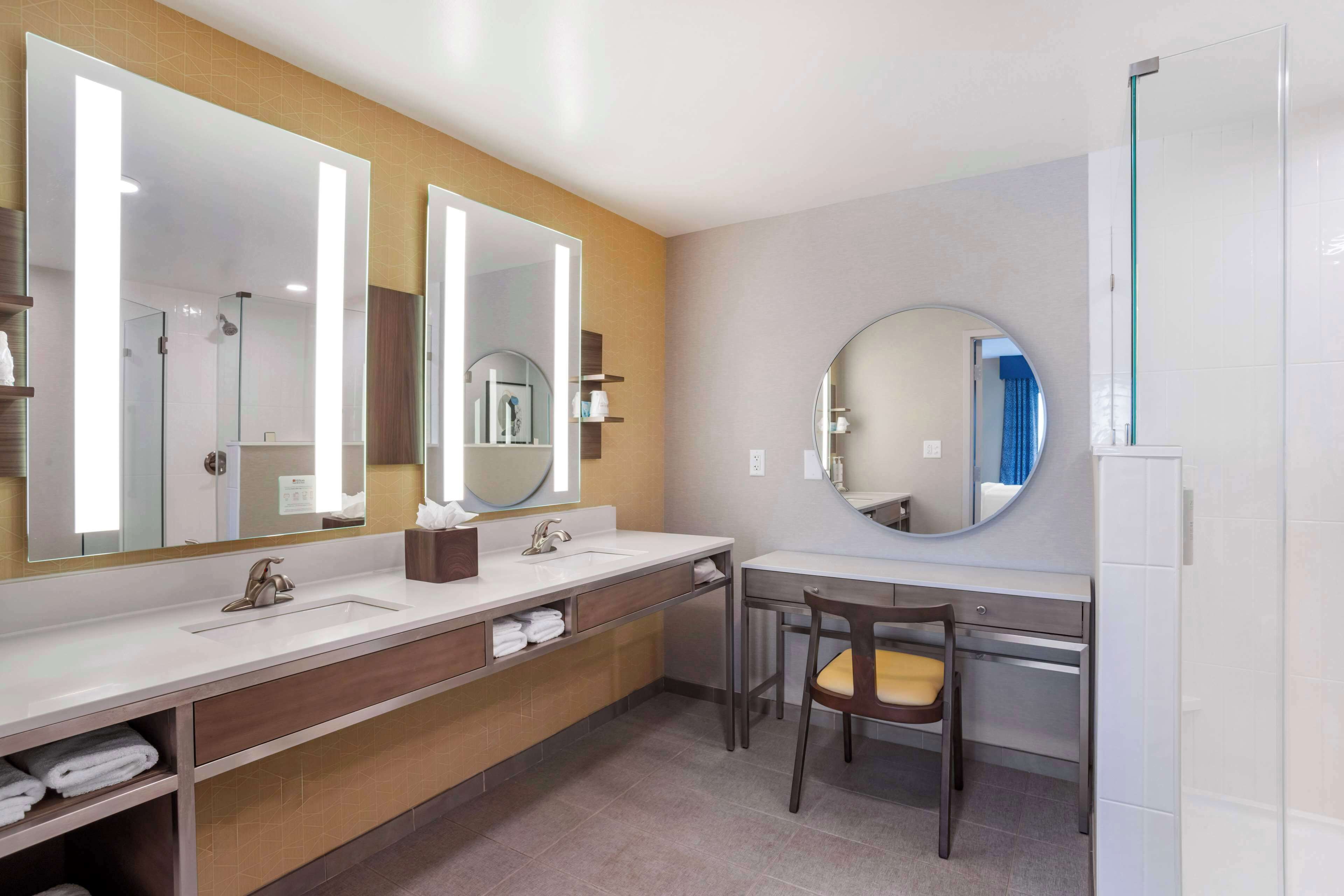 suite, 1 king bed | bathroom | combined shower/bathtub, hair dryer, towels, soap