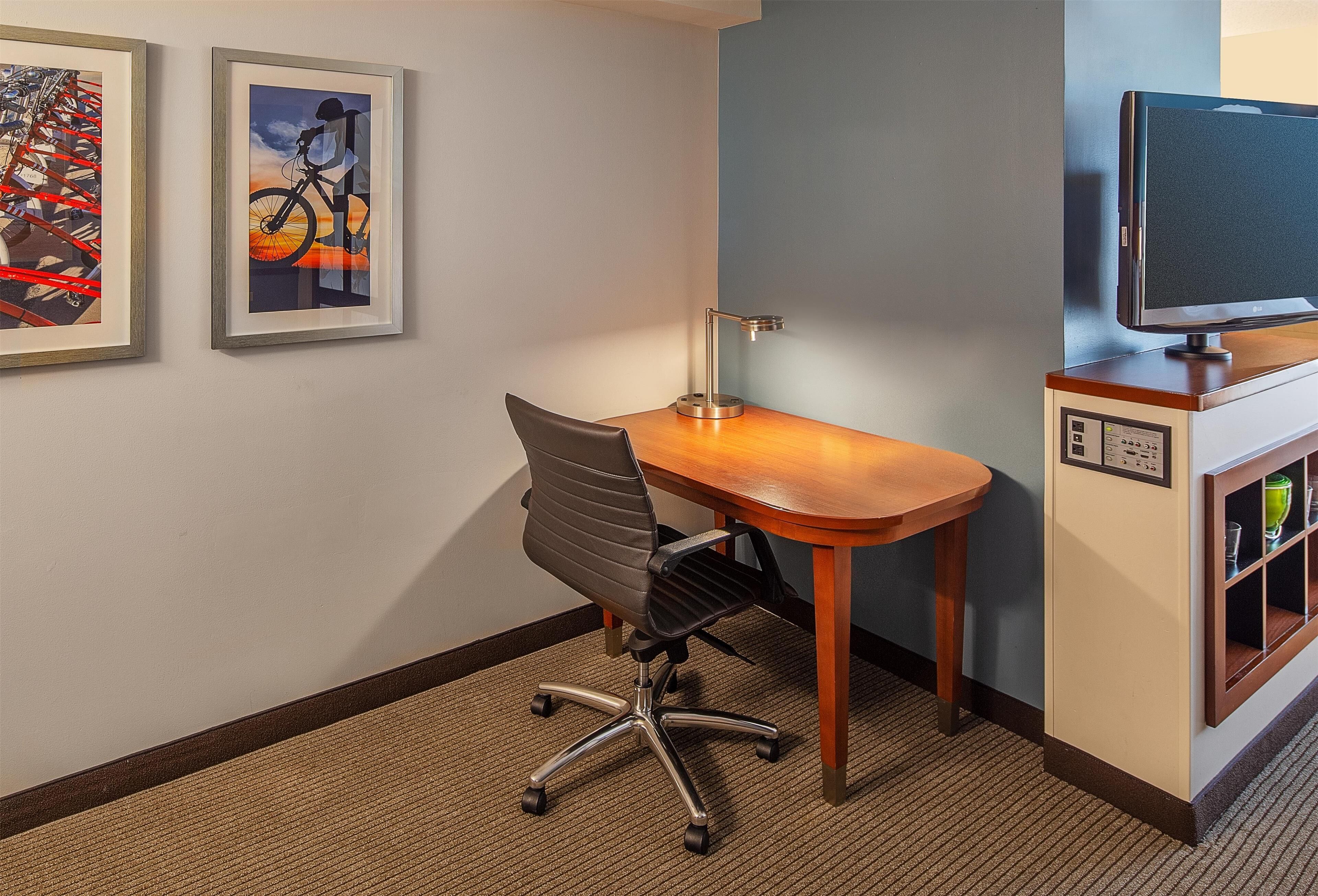 hypo-allergenic bedding, pillow-top beds, desk, blackout curtains