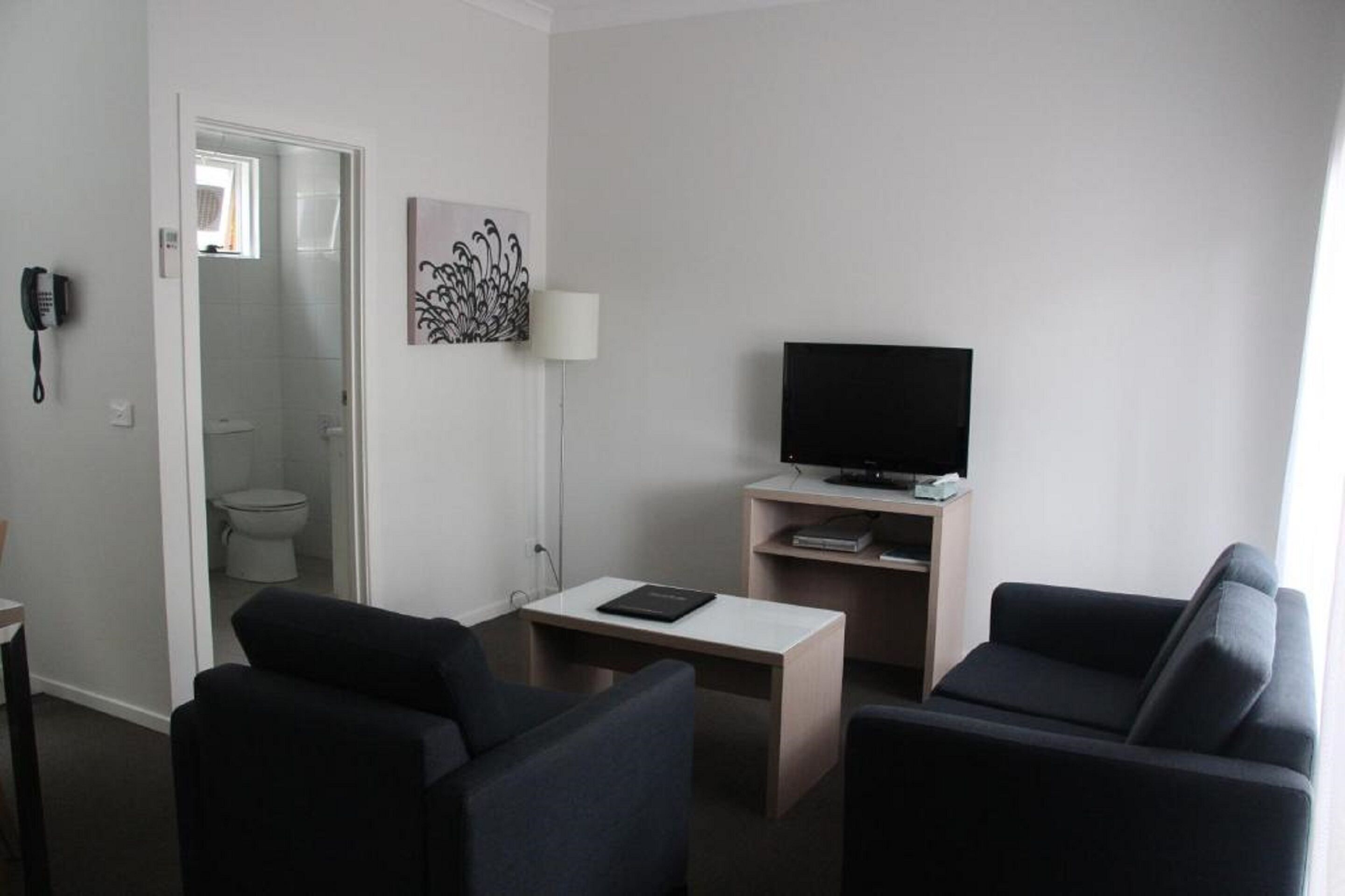 two bedroom family unit | living room | 45-inch tv with cable channels