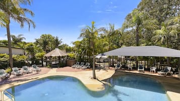 Seasonal outdoor pool, pool loungers