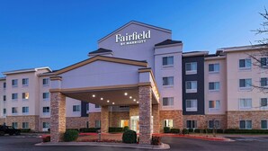 A Fairfield by Marriott hotel with a modern design, featuring a prominent entrance, multiple floors, and a brick facade. - Fairfield Inn & Suites Tulsa South Medical District (Tulsa)