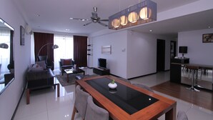 Premier Suite, 3 Bedrooms, 2 Bathrooms, Partial Sea View | Living area