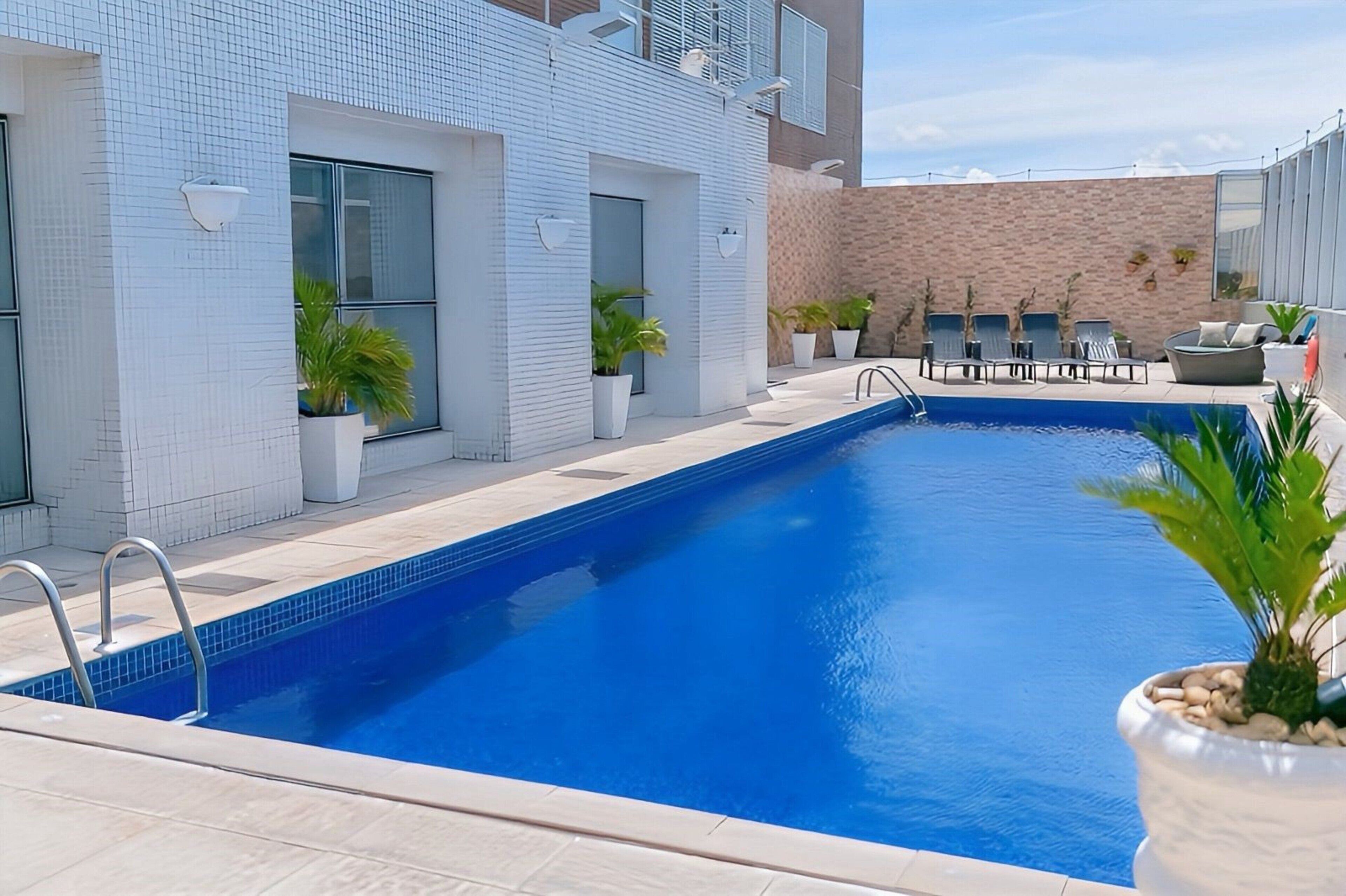 outdoor pool, pool loungers