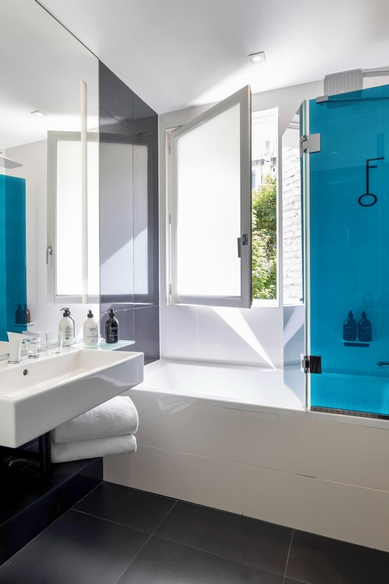 deluxe double room | bathroom | free toiletries, hair dryer, towels