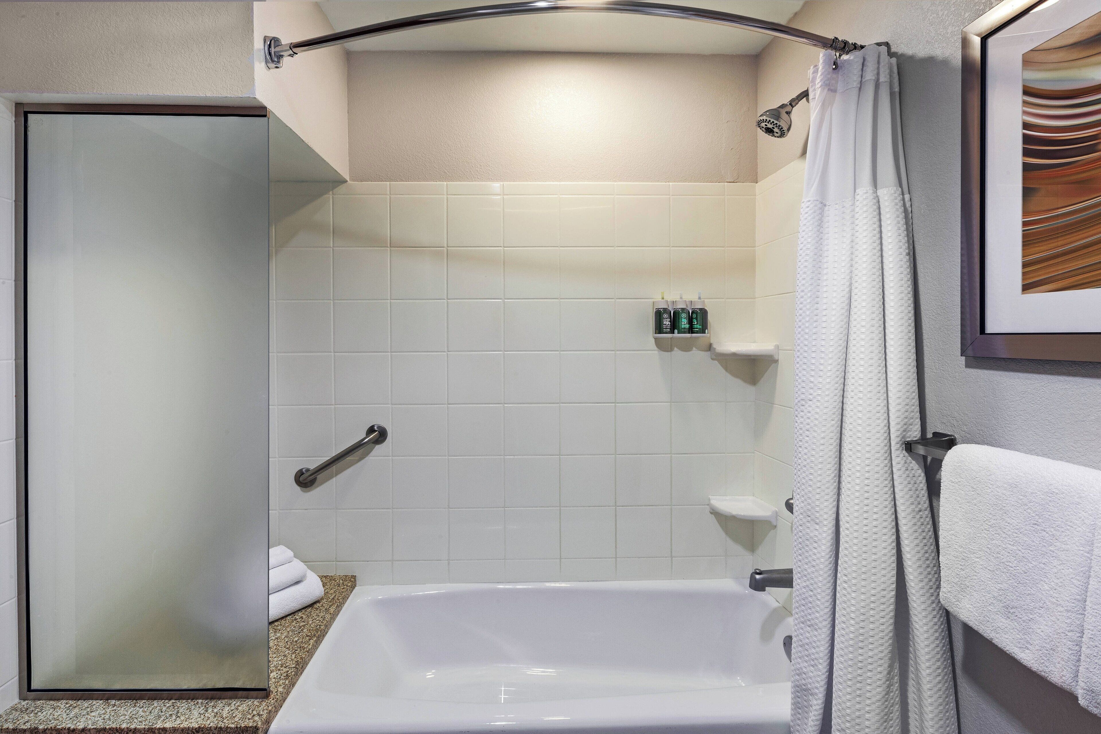 suite, 1 bedroom, non smoking, corner | bathroom | combined shower/bathtub, free toiletries, hair dryer, towels