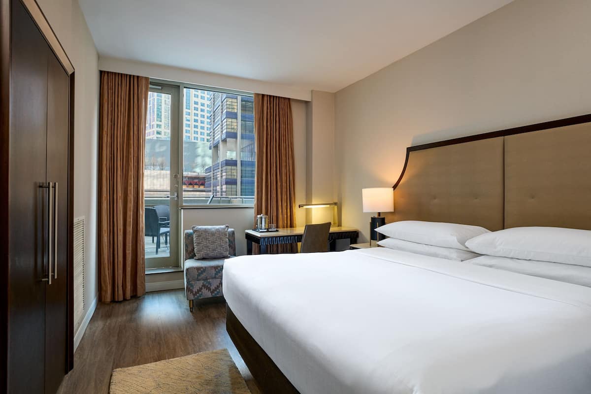 Hypo-allergenic bedding, down duvets, pillow-top beds, in-room safe