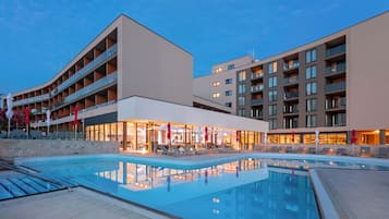 Seasonal outdoor pool, pool umbrellas, pool loungers