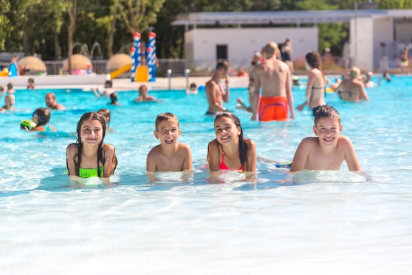 Seasonal outdoor pool, pool umbrellas, pool loungers