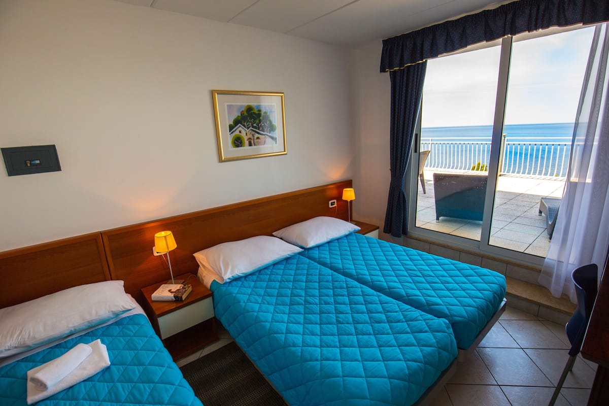 In-room safe, desk, blackout curtains, free cots/infant beds