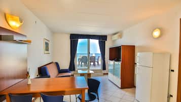 Apartment, 1 Bedroom, Terrace, Sea View (Panoramic View 3+2) | Living area | 43-inch LCD TV with satellite channels