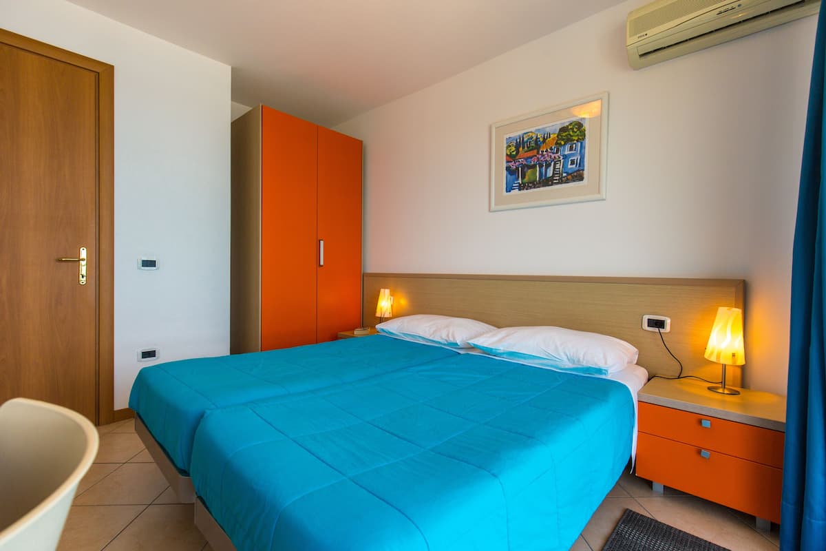 Apartment, 2 Bedrooms, Balcony (5+2) | In-room safe, desk, blackout drapes, bed sheets