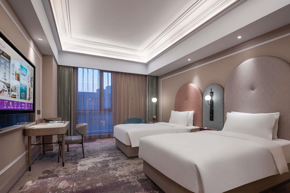 Free minibar items, in-room safe, desk, blackout drapes