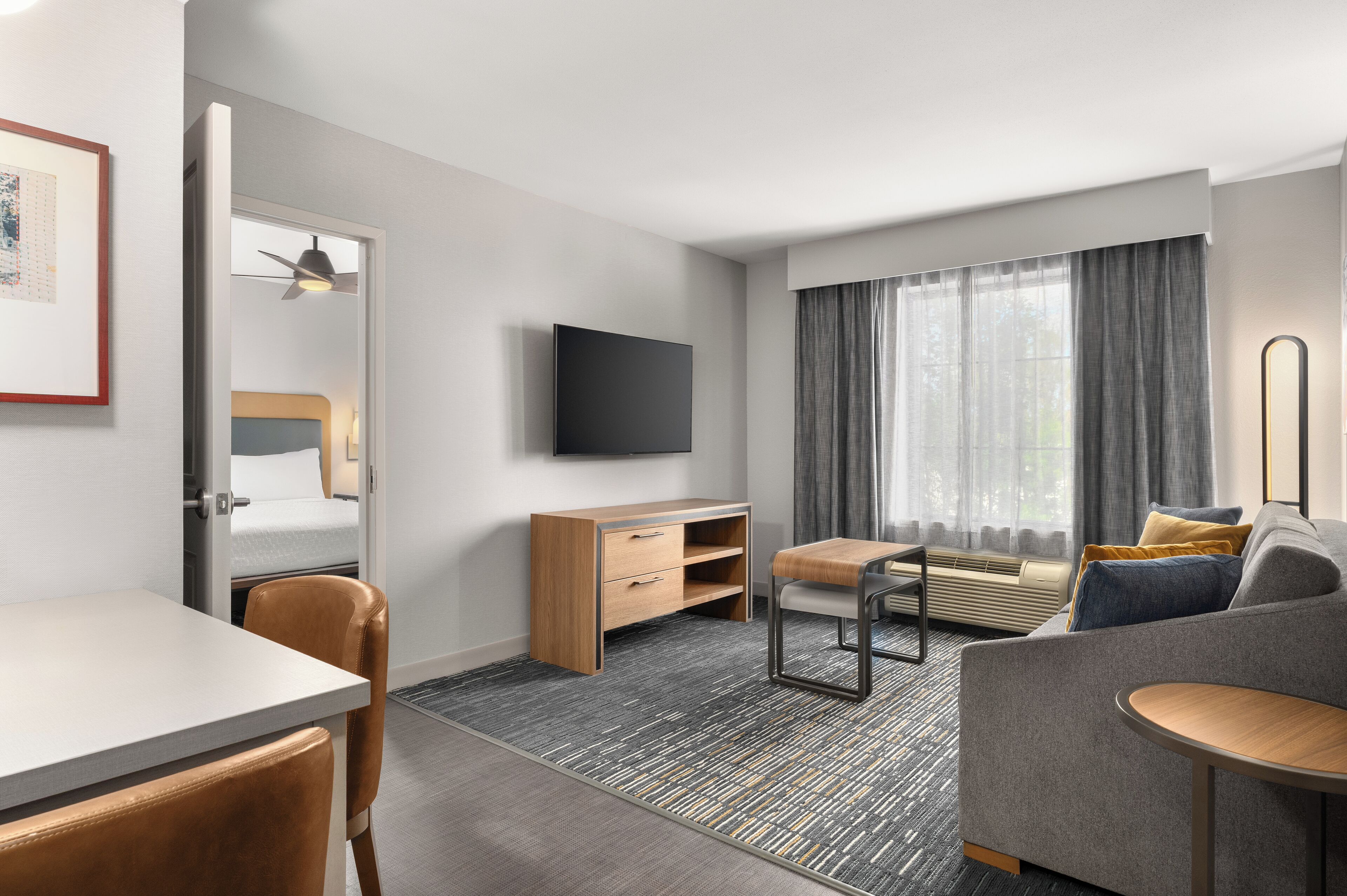 Suite, 1 King Bed, Non Smoking | Living area | 46-inch flat-screen TV with cable channels, TV, MP3 dock