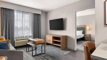 Suite, 1 King Bed, Non Smoking | Living area | 46-inch flat-screen TV with cable channels, TV, MP3 dock