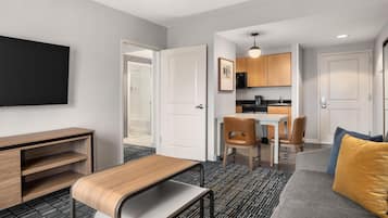 Suite, 1 King Bed, Non Smoking | Living area | 46-inch flat-screen TV with cable channels, TV, MP3 dock