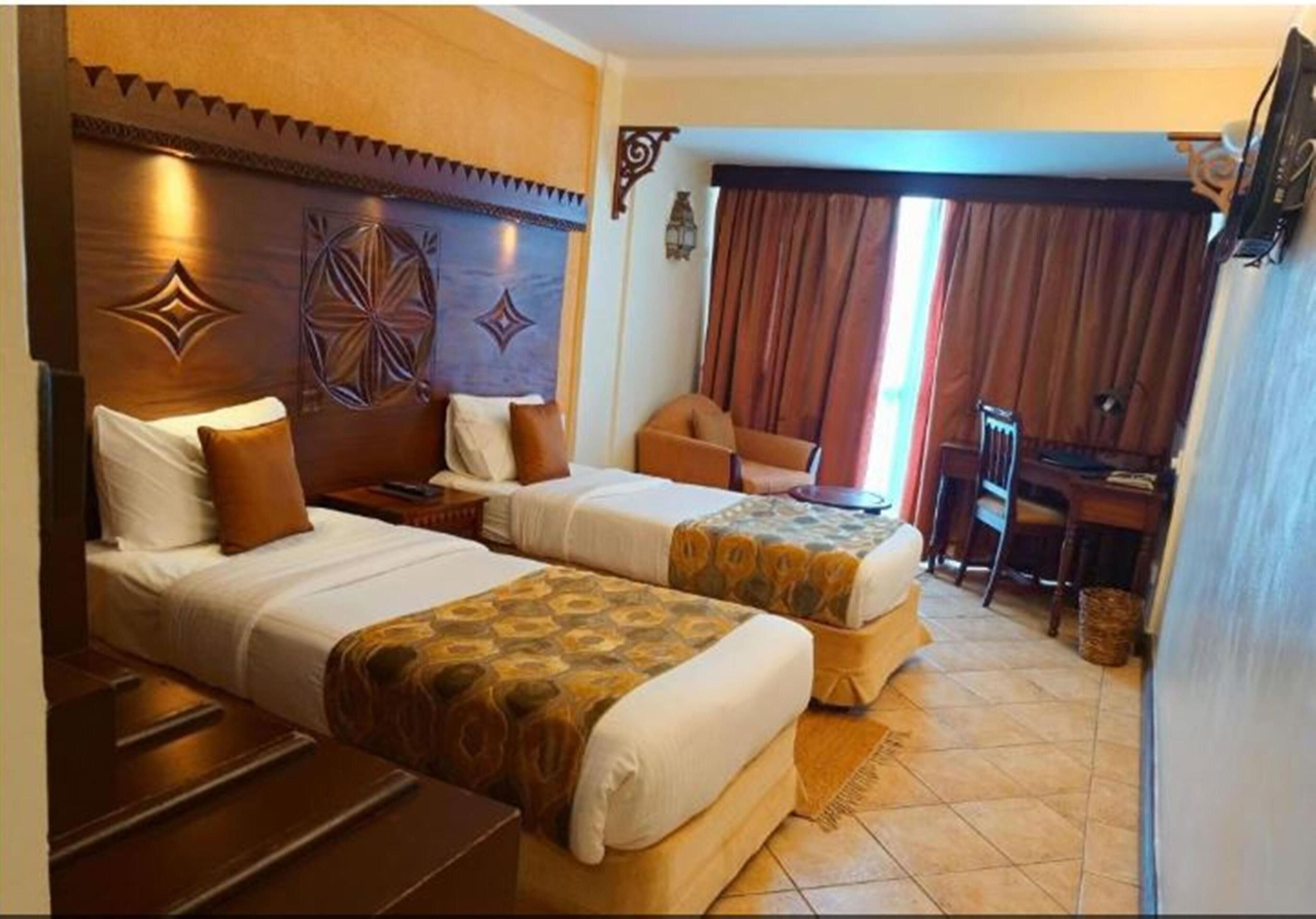 Ropa de cama de alta calidad y minibar 