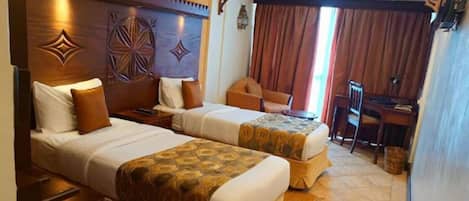 Ropa de cama de alta calidad y minibar