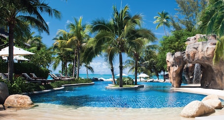 Outdoor pool, open 7:00 AM to 6:00 PM, free cabanas, pool umbrellas