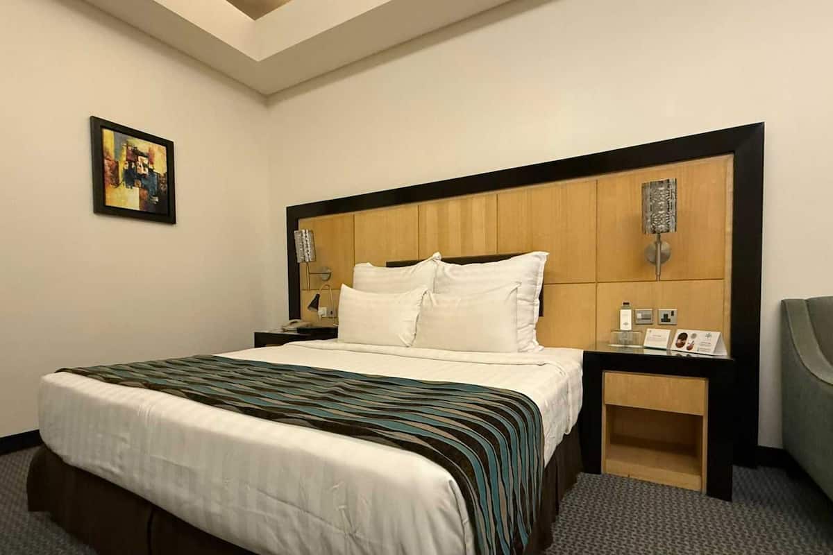 Junior Suite | 1 bedroom, premium bedding, minibar, in-room safe