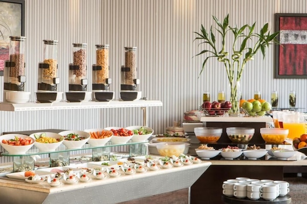 Breakfast, lunch, dinner served; international cuisine