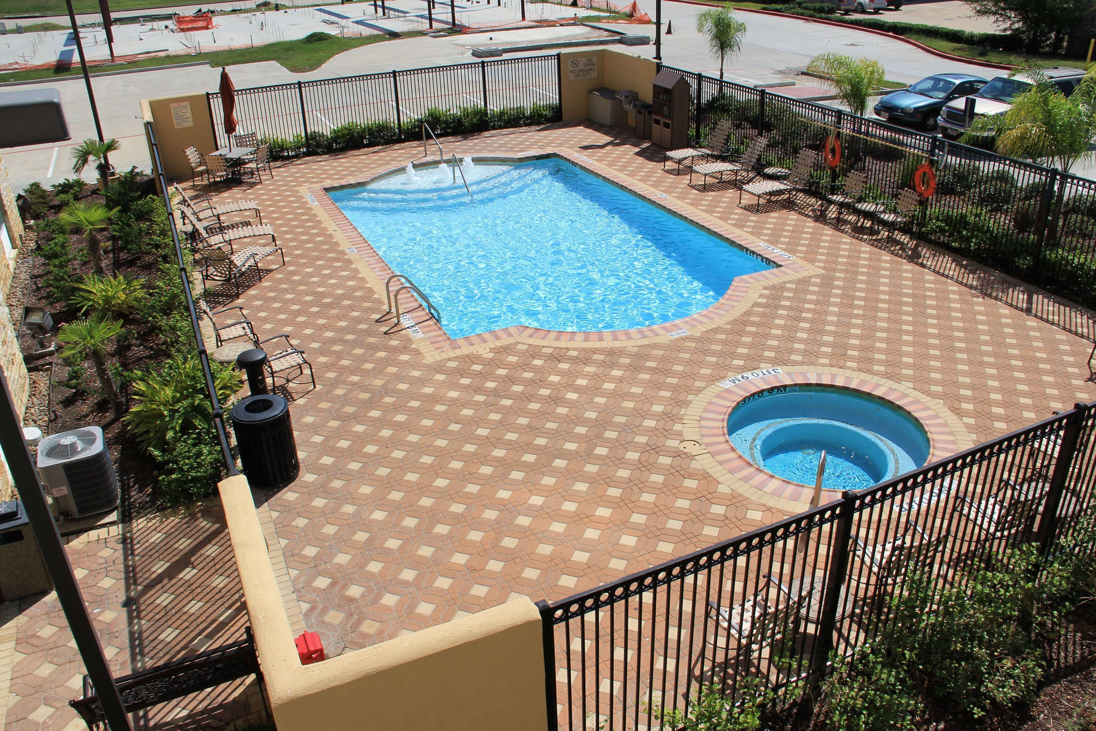 outdoor pool, pool umbrellas, pool loungers