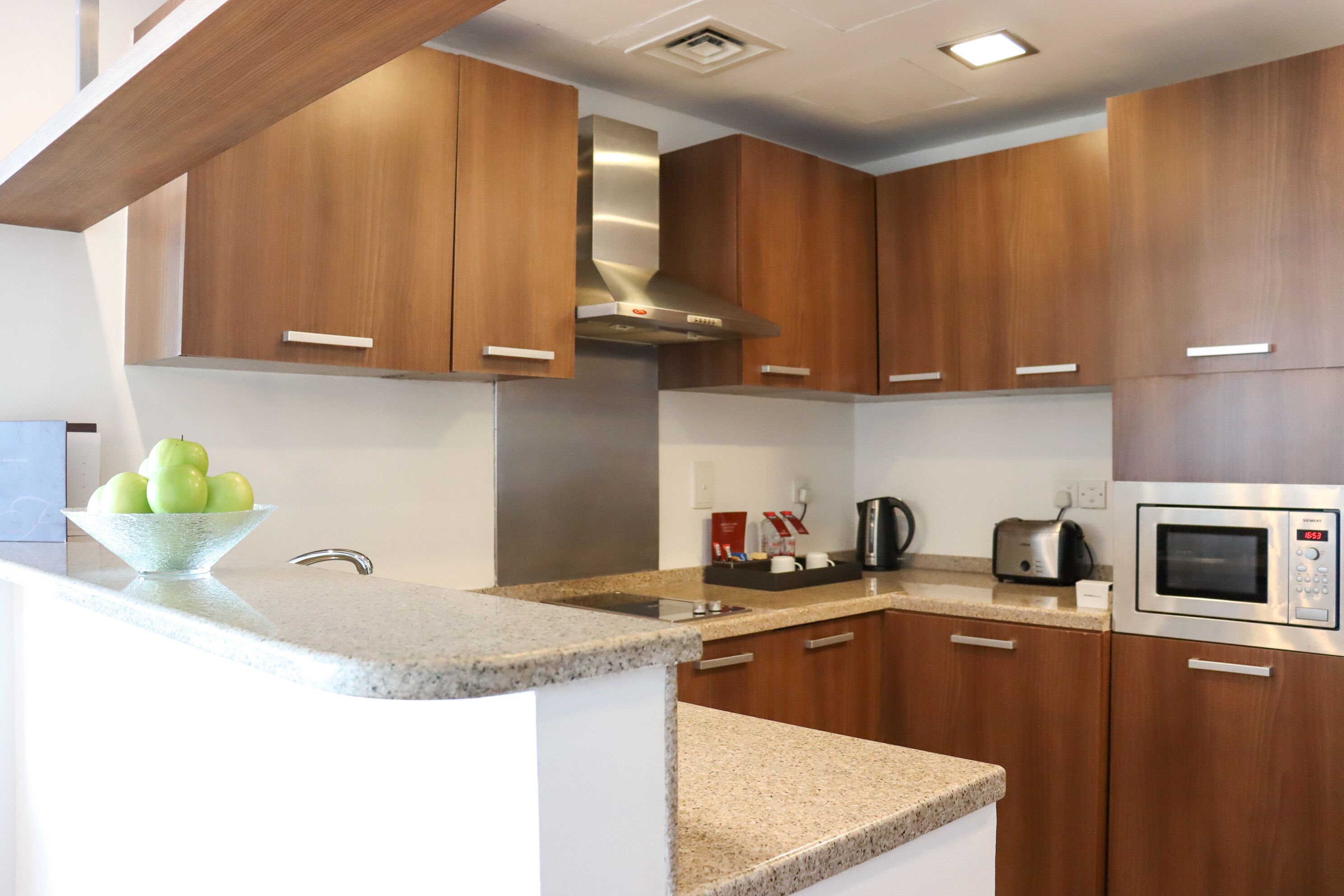 premier suite, 1 bedroom | private kitchen | coffee/tea maker, electric kettle, dining tables