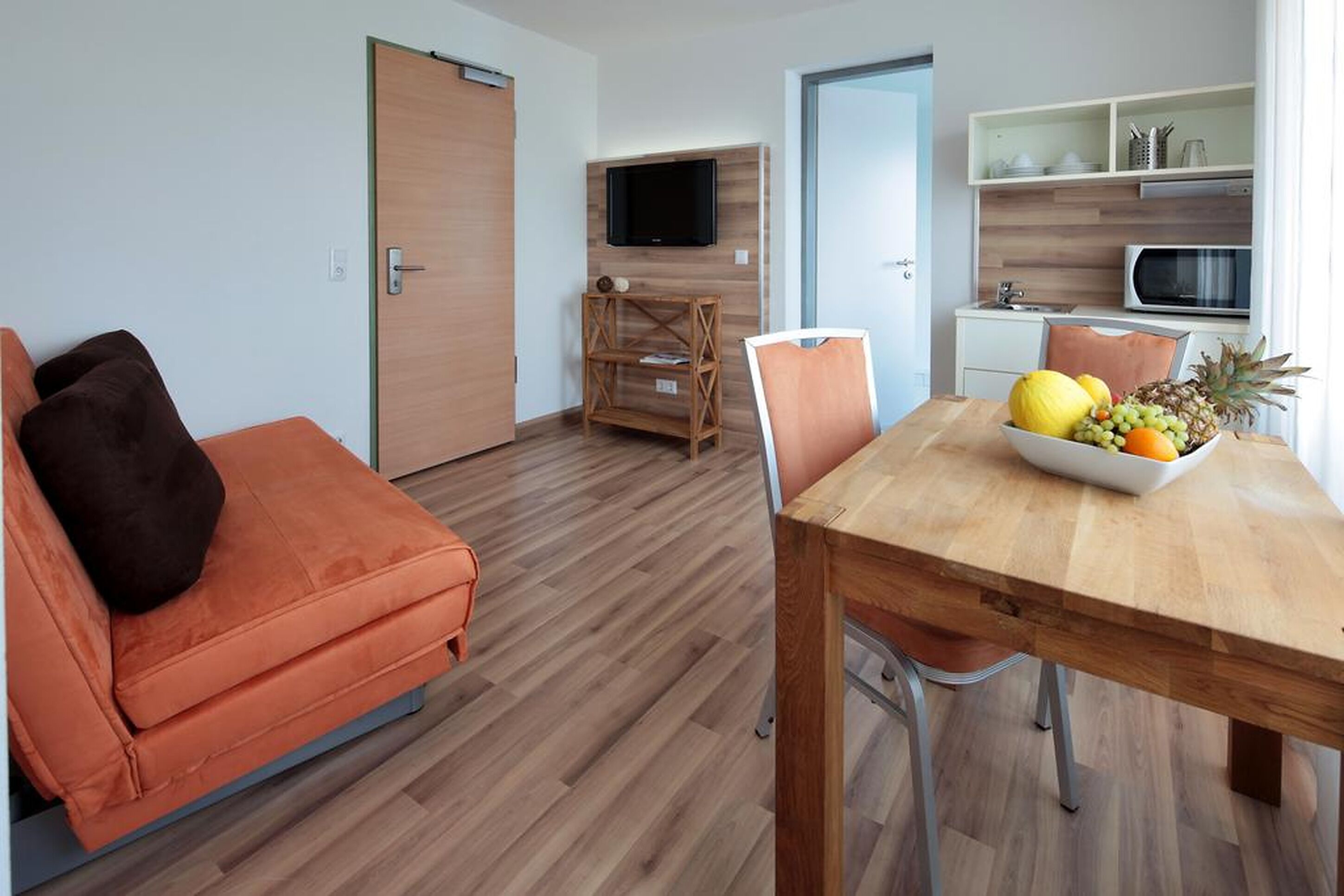 Standard-Apartment | Wohnbereich | Flachbildfernseher