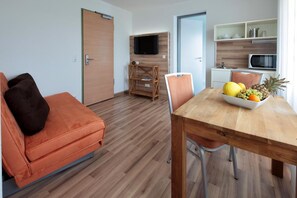 Appartamento Standard | Area soggiorno | TV a schermo piatto