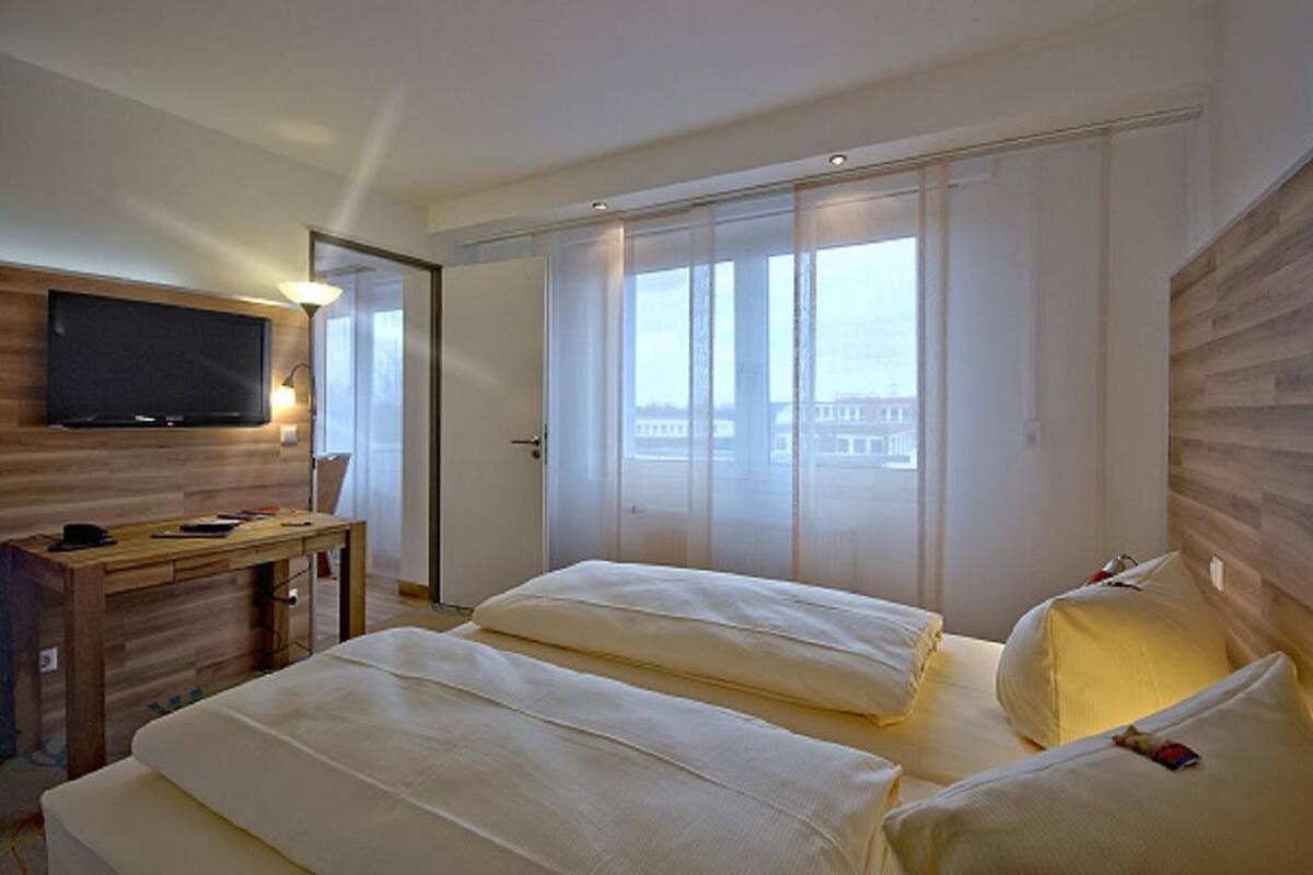 Apartamento estándar | Minibar, escritorio, cortinas opacas y sistema de insonorización