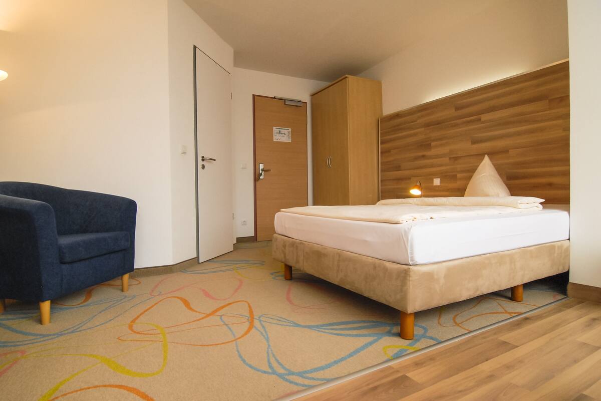 Habitación Business (Queen Bed) | Minibar, escritorio, cortinas opacas y sistema de insonorización