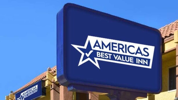 A sign for the Americas Best Value Inn, indicating the name and branding of the hotel. - Americas Best Value Inn Story City (Story City)