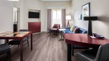 Suite, 1 King Bed with Sofa bed | Living area | 37-inch flat-screen TV with digital channels, TV, Netflix