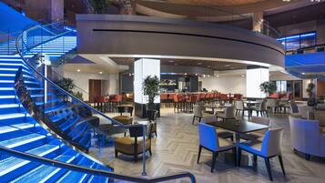 5 bars/lounges, poolside bar