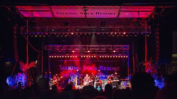 A stage with a band performing at Talking Stick Resort.