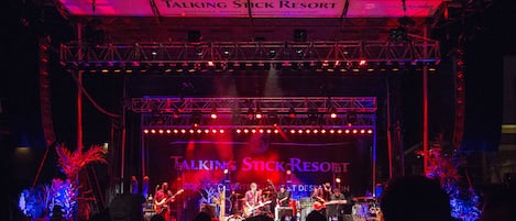 A stage with a band performing at Talking Stick Resort.