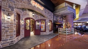 A brick building with a neon sign reading 'Bordello' and a wooden ceiling. - Choctaw Casino & Resort Durant, a Wyndham Grand Hotel (Durant)
