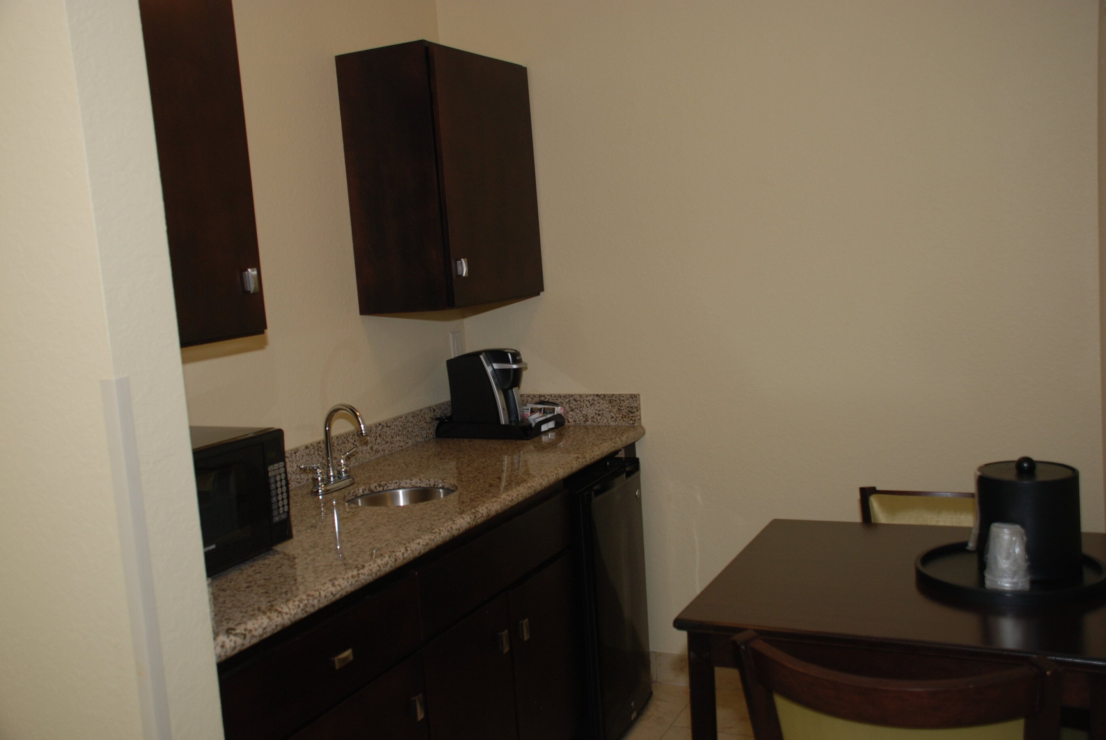 suite, 1 king bed, jetted tub | 1 bedroom, desk, laptop workspace, iron/ironing board