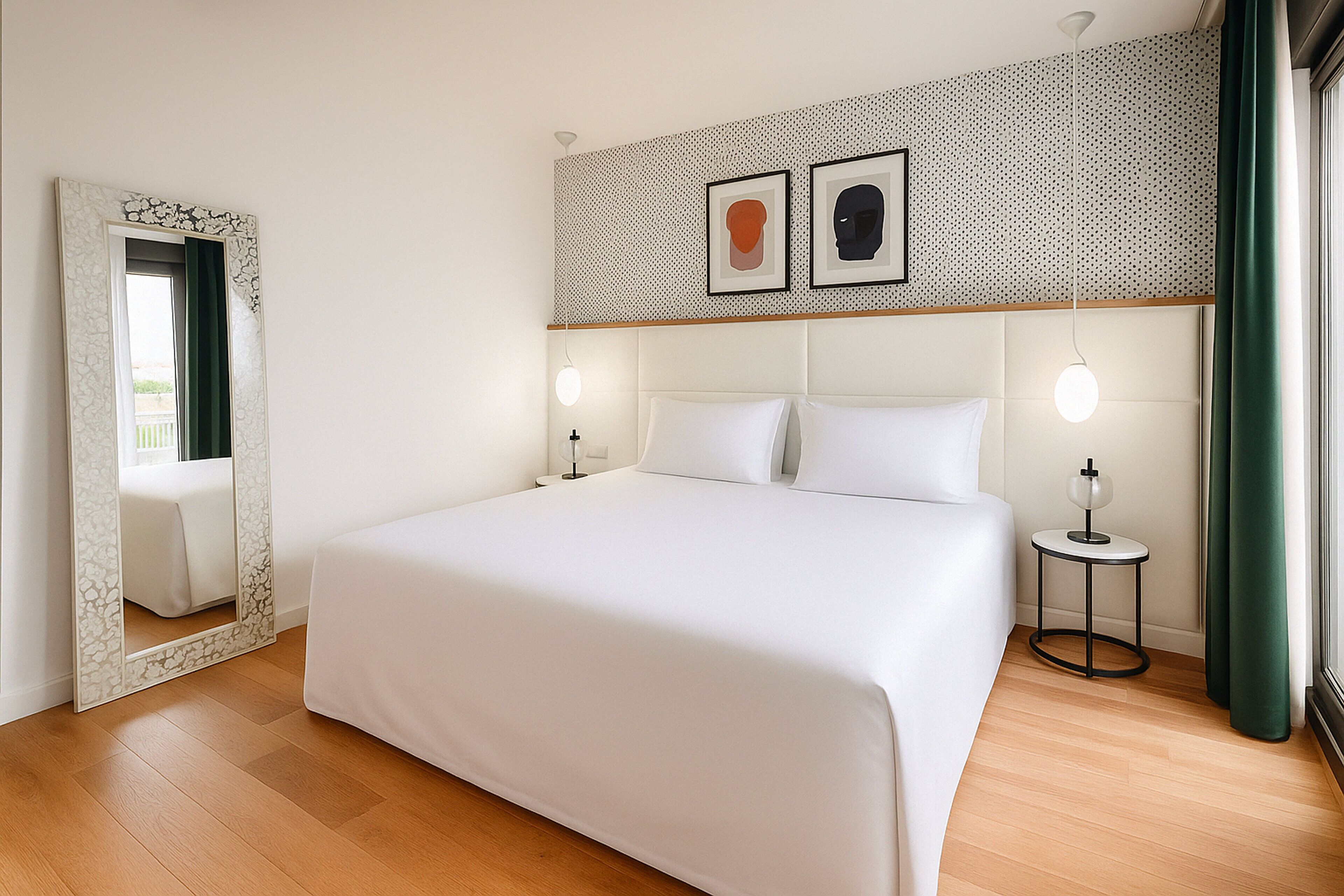 A modern hotel room with a large bed, a mirror, two wall-mounted lamps, and a patterned wall.