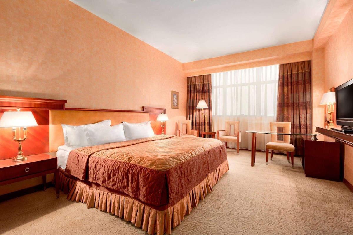 Deluxe King Room | Ropa de cama de alta calidad y minibar