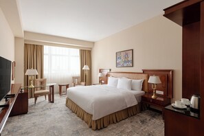 Deluxe King Room | Ropa de cama de alta calidad y minibar 