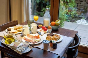 Daily buffet breakfast (EUR 12 per person)