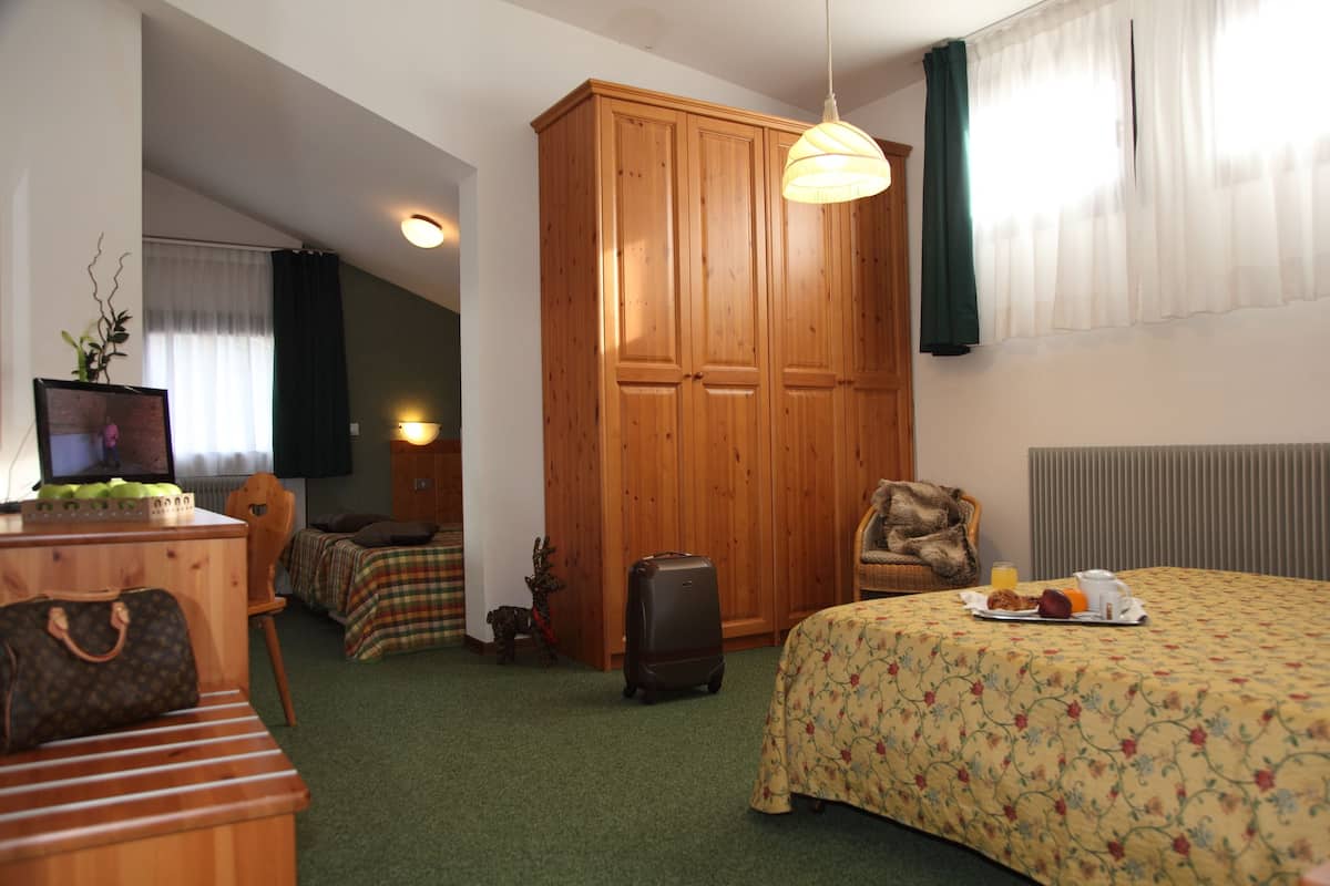 Quadruple Room, Balcony | Down comforters, in-room safe, desk, free WiFi