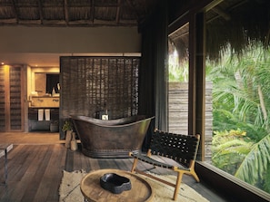 Suite (Palm Suite) | 1 bedroom, in-room safe, individually furnished, blackout drapes
