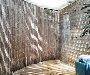 Designer toiletries, hair dryer, bathrobes, towels